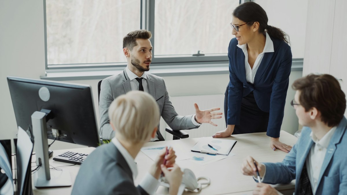 Business leaders meeting to discuss investor and growth network relationships